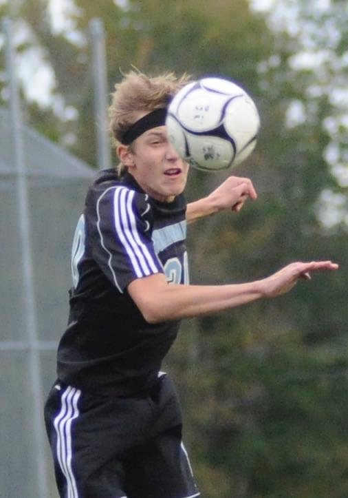A real head for the game. Sullivan West’s Brody Herbert uses his noggin to advance the ball.